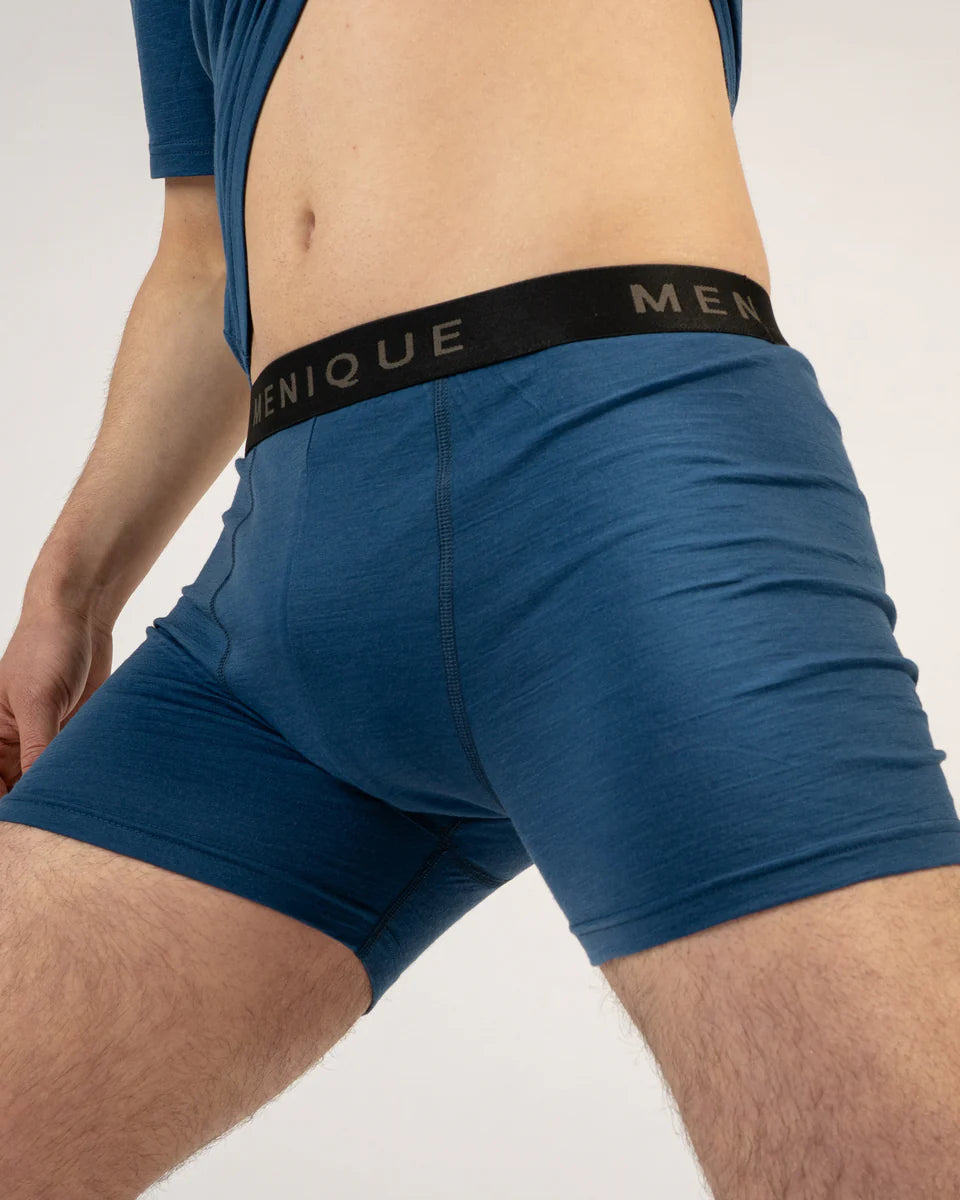 Blue men's underwear with a visible brand logo on a plain background