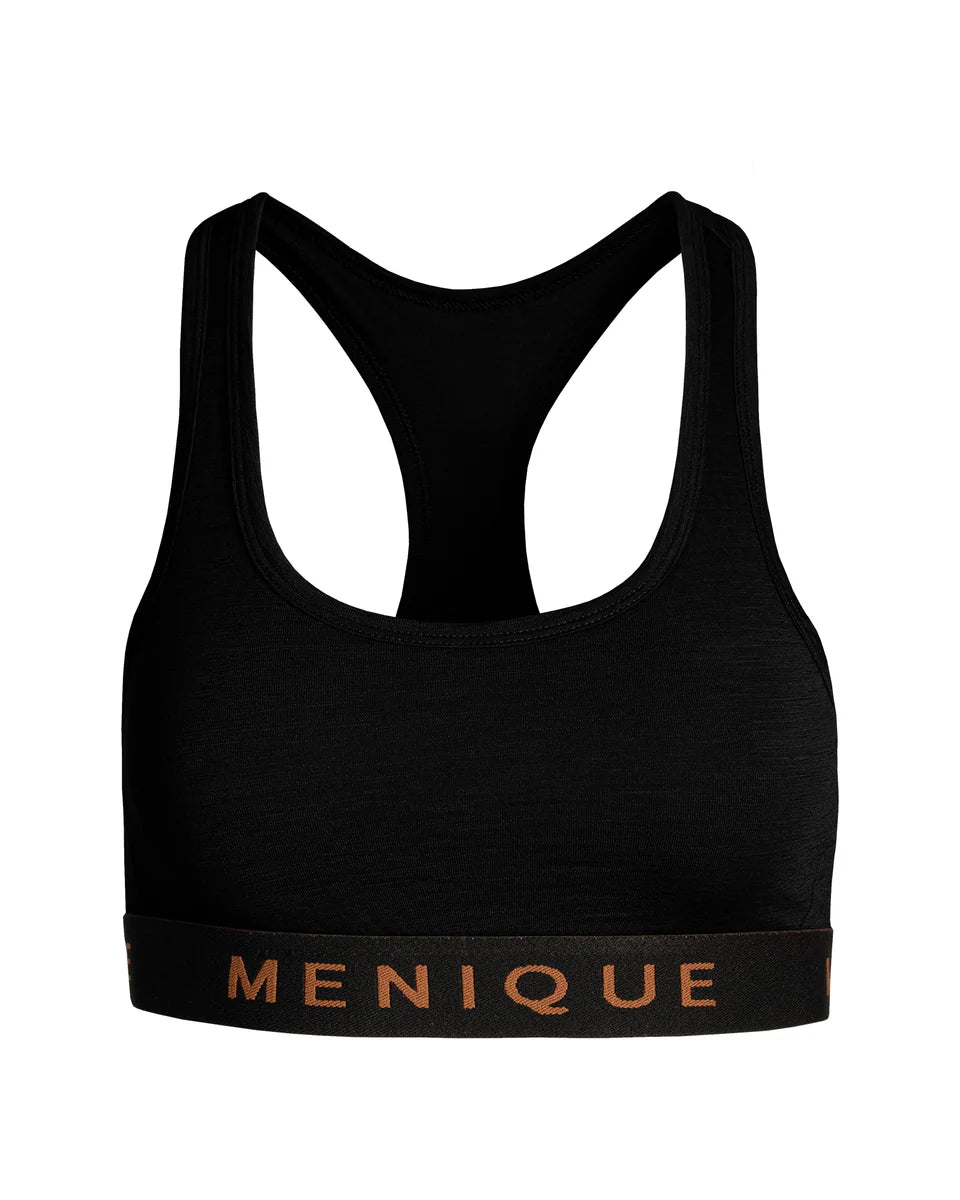 Black sports bra with 'Menique' branding on a white background