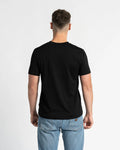 Person wearing a black t-shirt and blue jeans on a white background